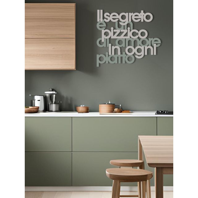 Scritta da parete "Il segreto è un pizzico di..." in legno di CalleaDesign